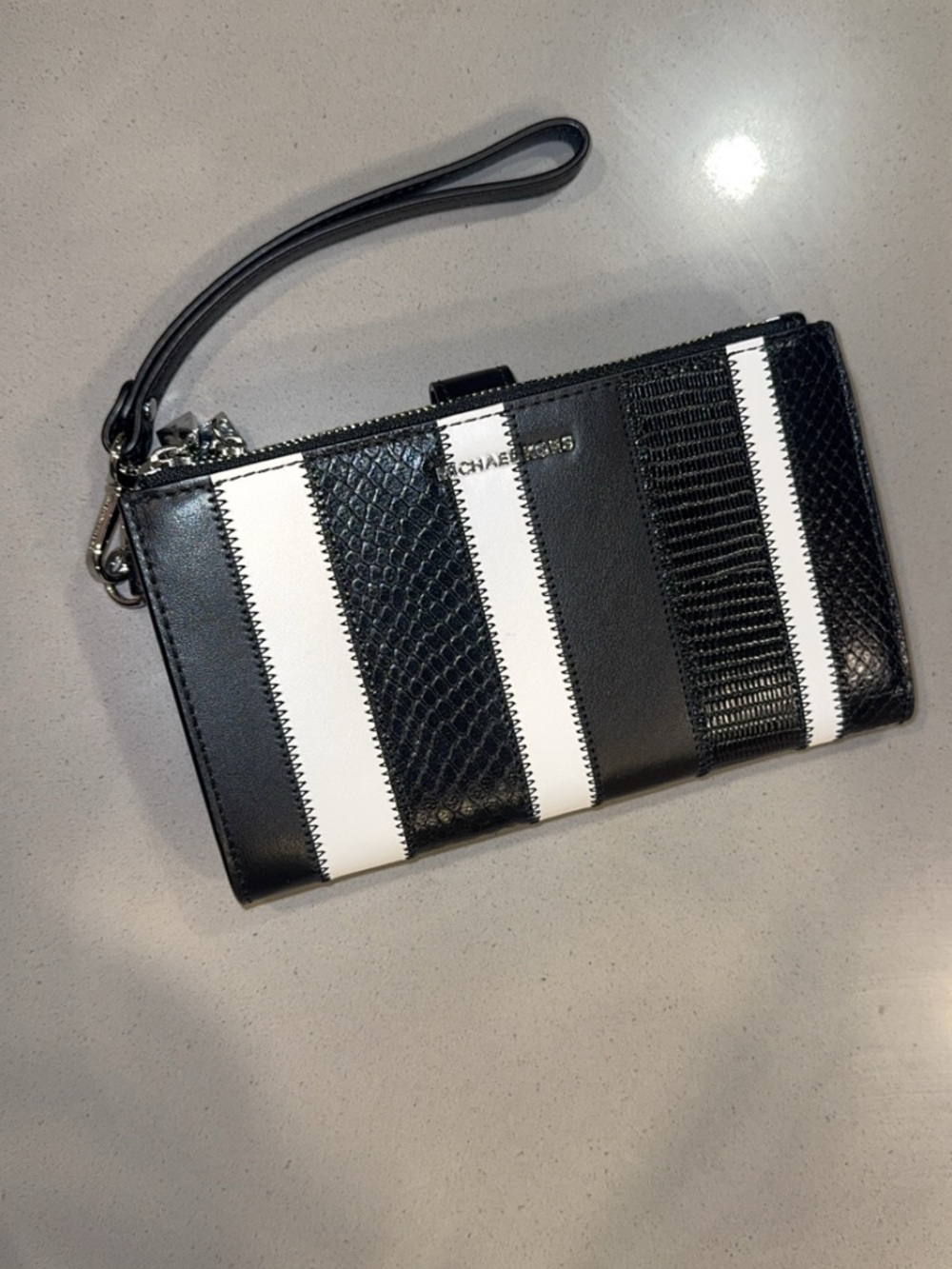 MICHAEL KORS Black and White Striped Leather Wristlet